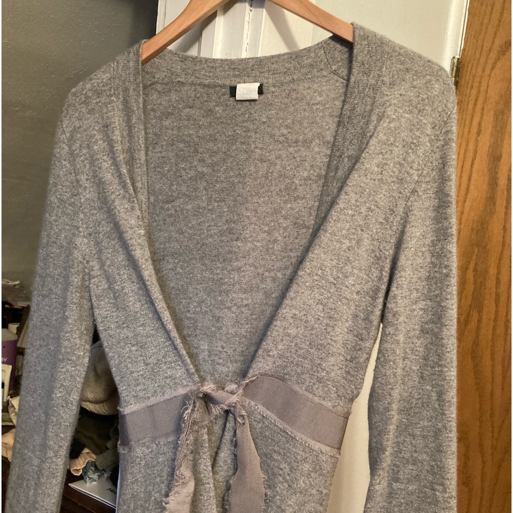 J Crew wrap sweater.  40% merino wool  30% viscose  20% angora  10% cashmere.